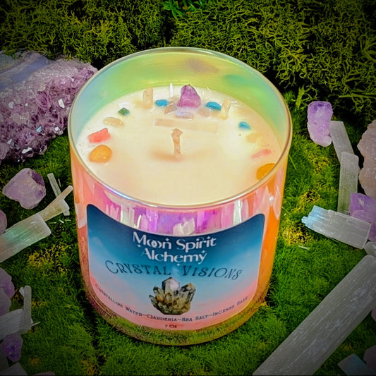 Candle in a glass jar with colorful crystals on a green moss background